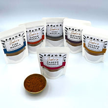 Load image into Gallery viewer, Image of the full range of Sashi&#39;s masalas. 6 packets of 50g masalas with Paneer in front. 
